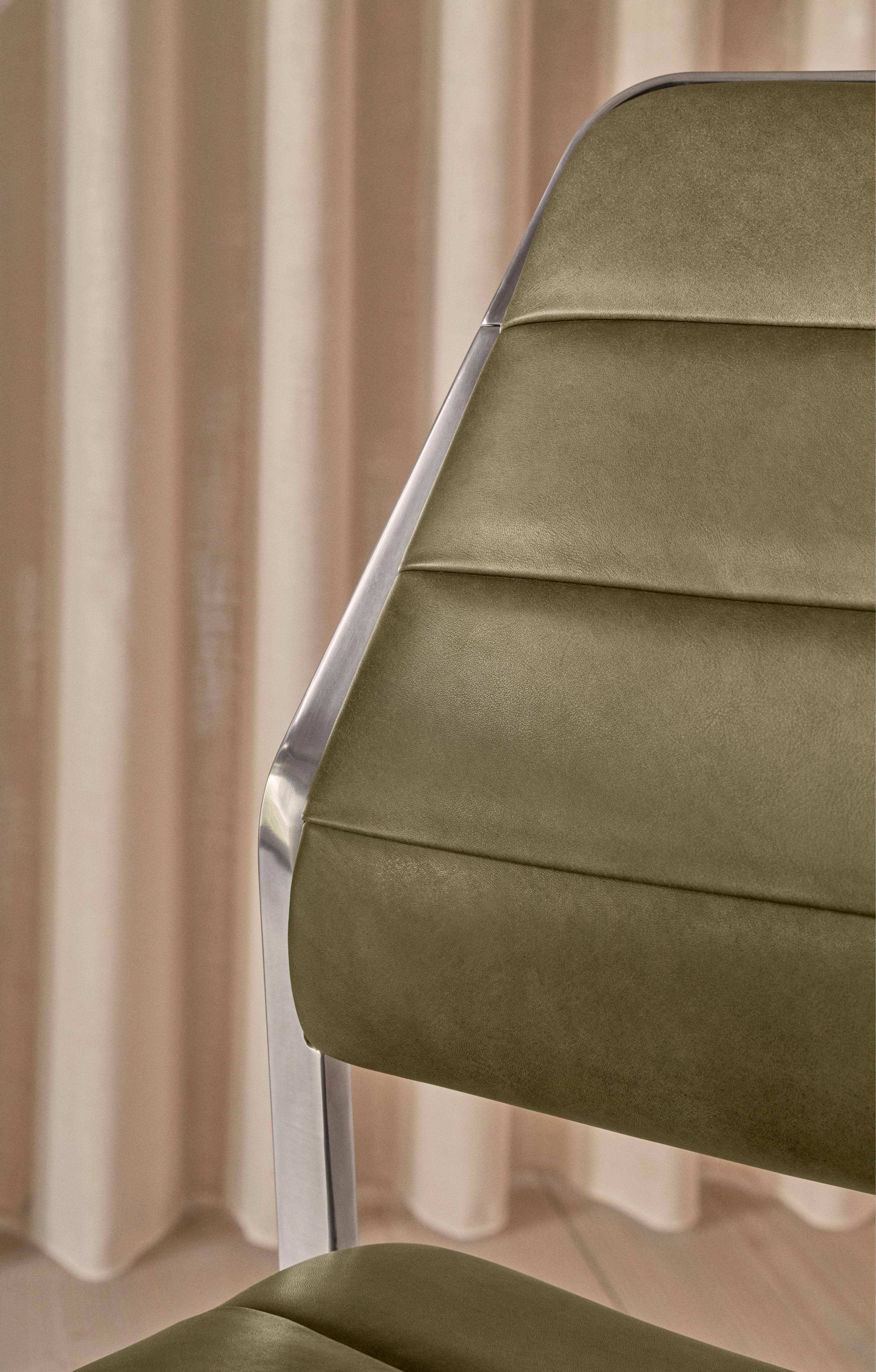 Office chair 454 green leather with a metal base
